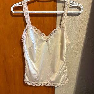 A nylon crop tank, with lace on the sides.